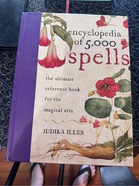 Encyclopedia of 5,000 Spells by Judika Illes - Cream & Purple Cover